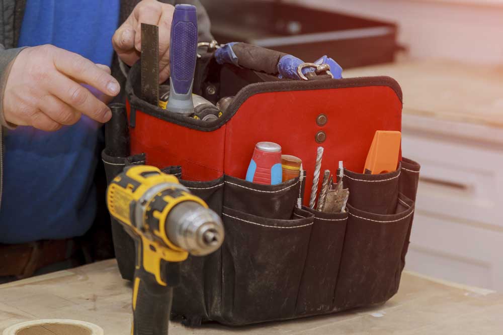 Robust tool bag with multiple storage pockets, designed for construction and DIY professionals.