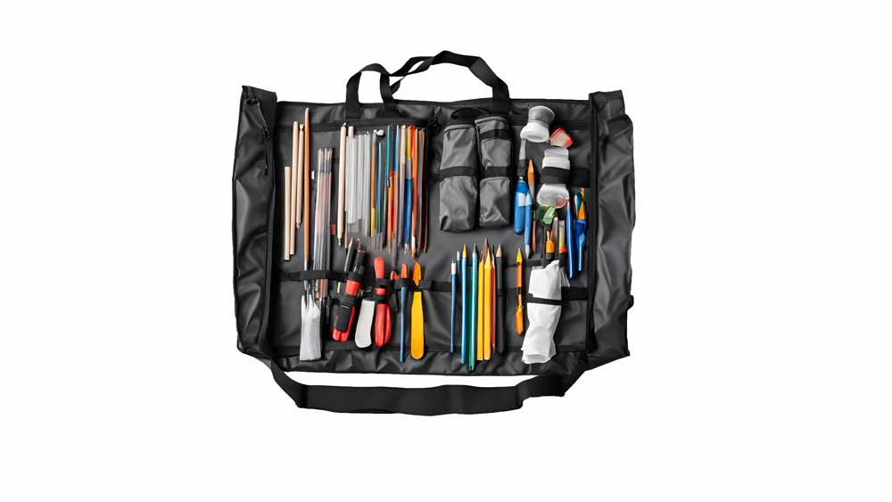 Professional bag with multiple compartments and storage pockets for art supplies.